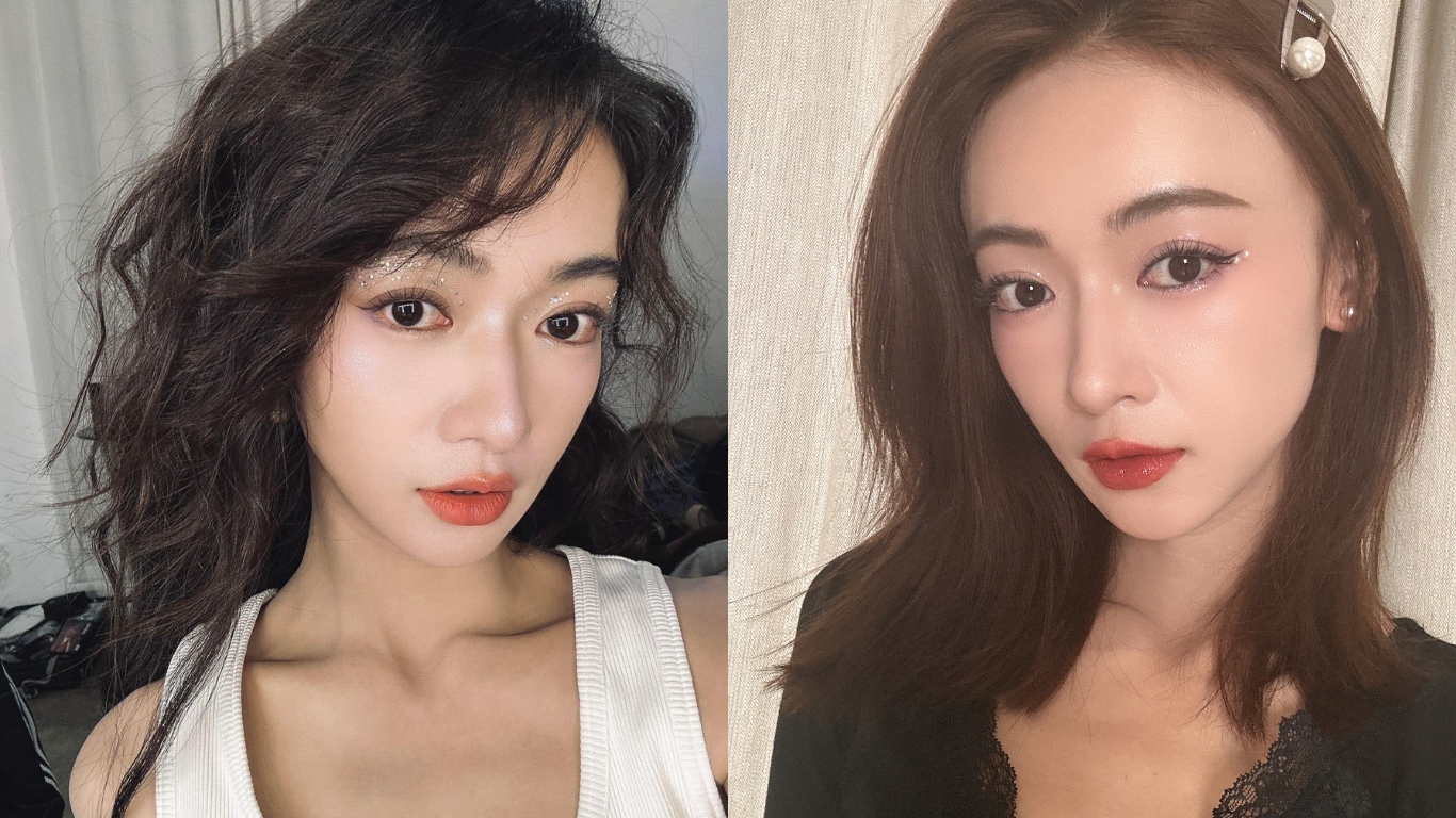 Cẩm nang dưỡng da, trang điểm của Ngô Cẩn Ngôn Trang điểm ánh nhũ: Bên cạnh son cam, Ngô Cẩn Ngôn cũng yêu thích phong cách trang điểm với ánh nhũ lấp lánh. Không chỉ sử dụng phấn nhũ, mỹ nhân Diên Hi công lược còn kết hợp đính đá và hạt nhũ kim tuyến trên phần bầu mắt hoặc đuôi mắt tạo hiệu ứng lấp lánh, giúp đôi mắt trông to tròn hơn. Cô thường sử dụng phấn mắt có tông màu nhẹ nhàng như hồng đào, cam đào… sau đó kẻ đường eyeliner mảnh và chuốt mascara giúp giữ vẻ đẹp tự nhiên và tạo sự cân bằng với độ lấp lánh của ánh nhũ.